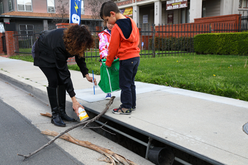 Residents clearing the drain