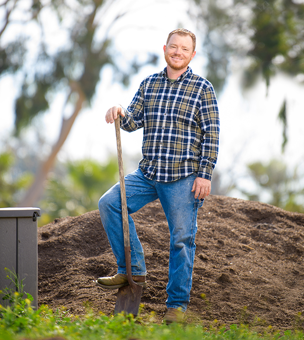 Erick Unger holding a shovel